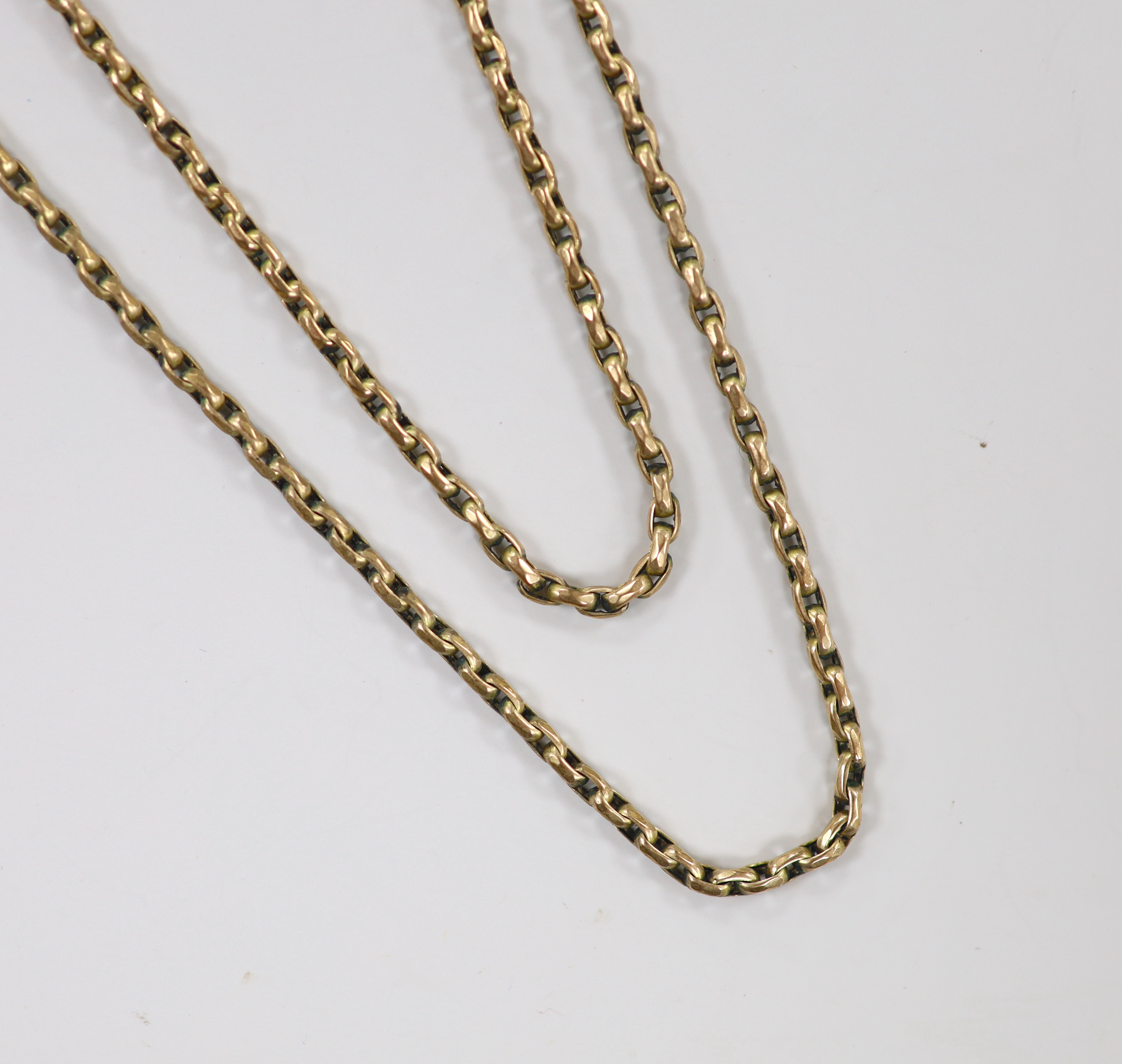 A late Victorian 9ct guard chain, 148cm, 26 grams.